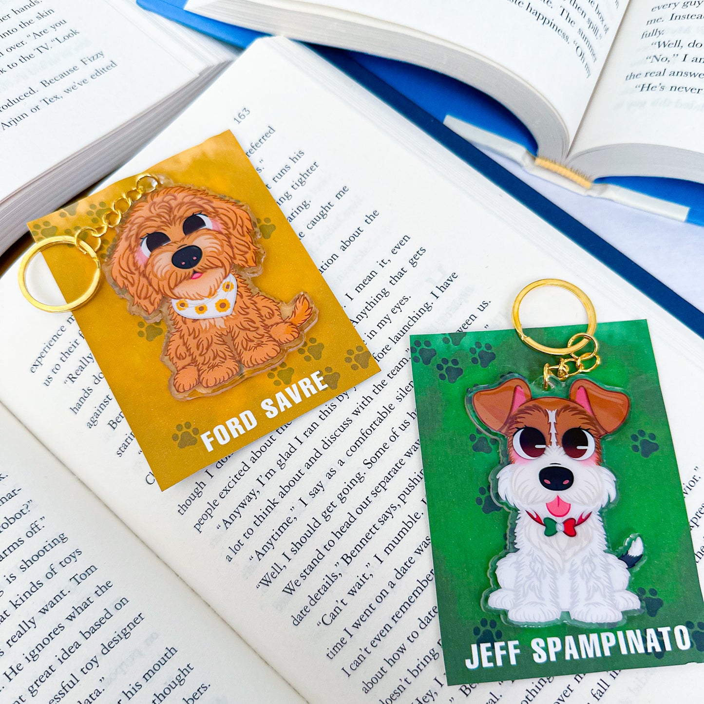 A keychain featuring two illustrated puppies, designed with playful and heartwarming details.