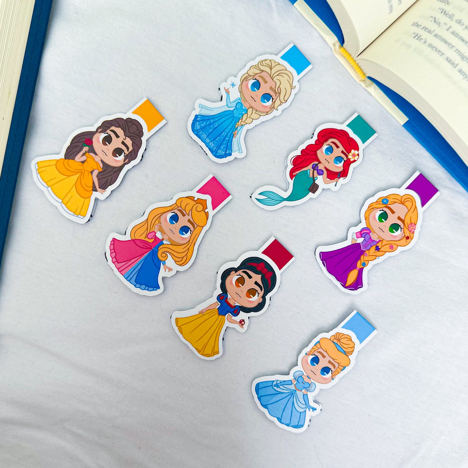 Magnetic bookmarks inspired by Disney Princesses, featuring Cinderella, Belle, Ariel, and their iconic accessories and castles.