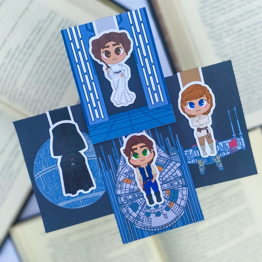 Magnetic bookmarks inspired by the Star Wars original trilogy, featuring Luke, Leia, Han Solo, and galactic motifs.